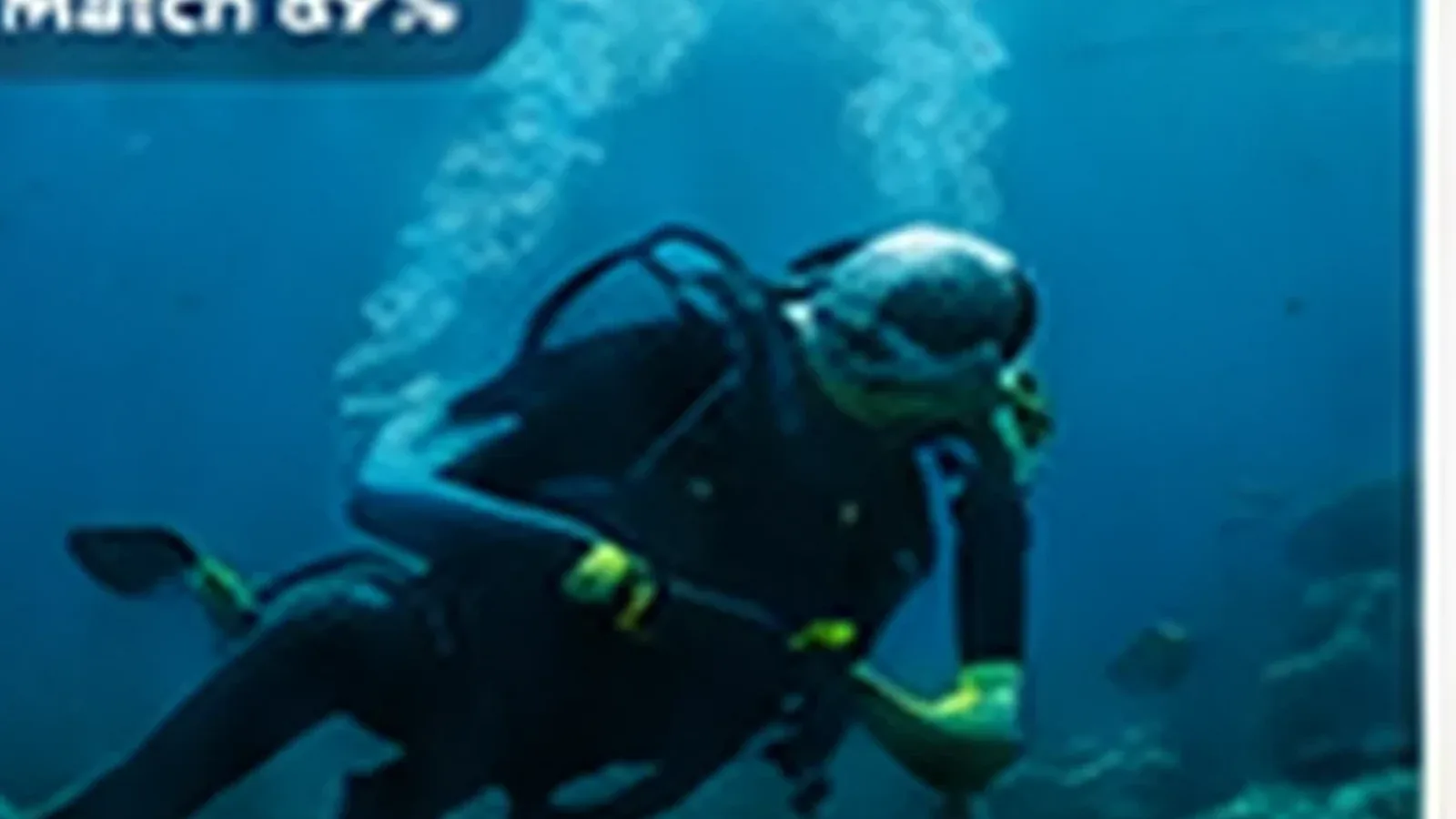 Scuba diver exploring clear tropical water in Sri Lanka
