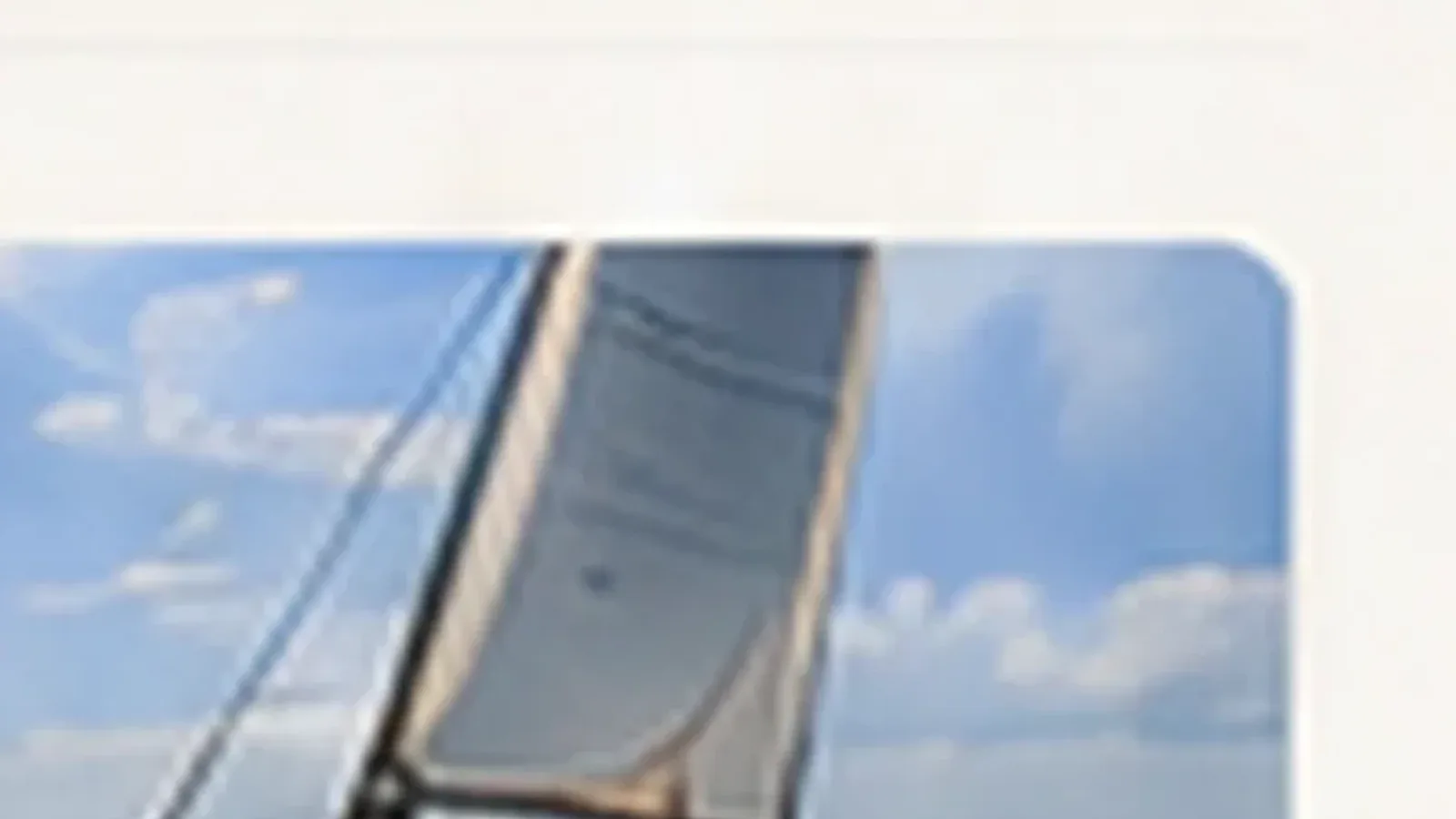 Boat charter in Sri Lanka. Sailing boat on open water off the Sri Lankan coast